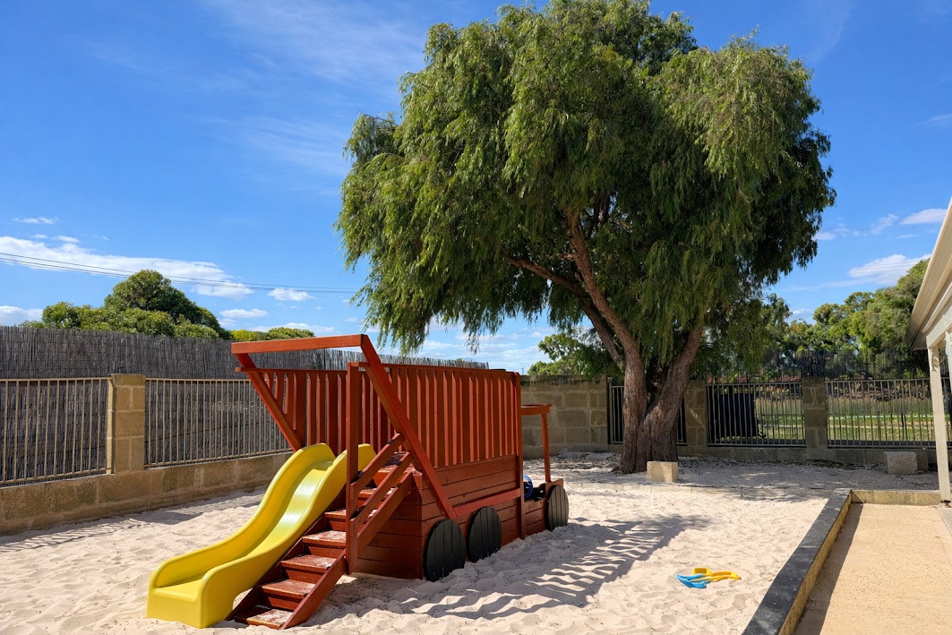 Shaded sandpit and climbing playground at Super Stars Early Learning Centre Cooloongup